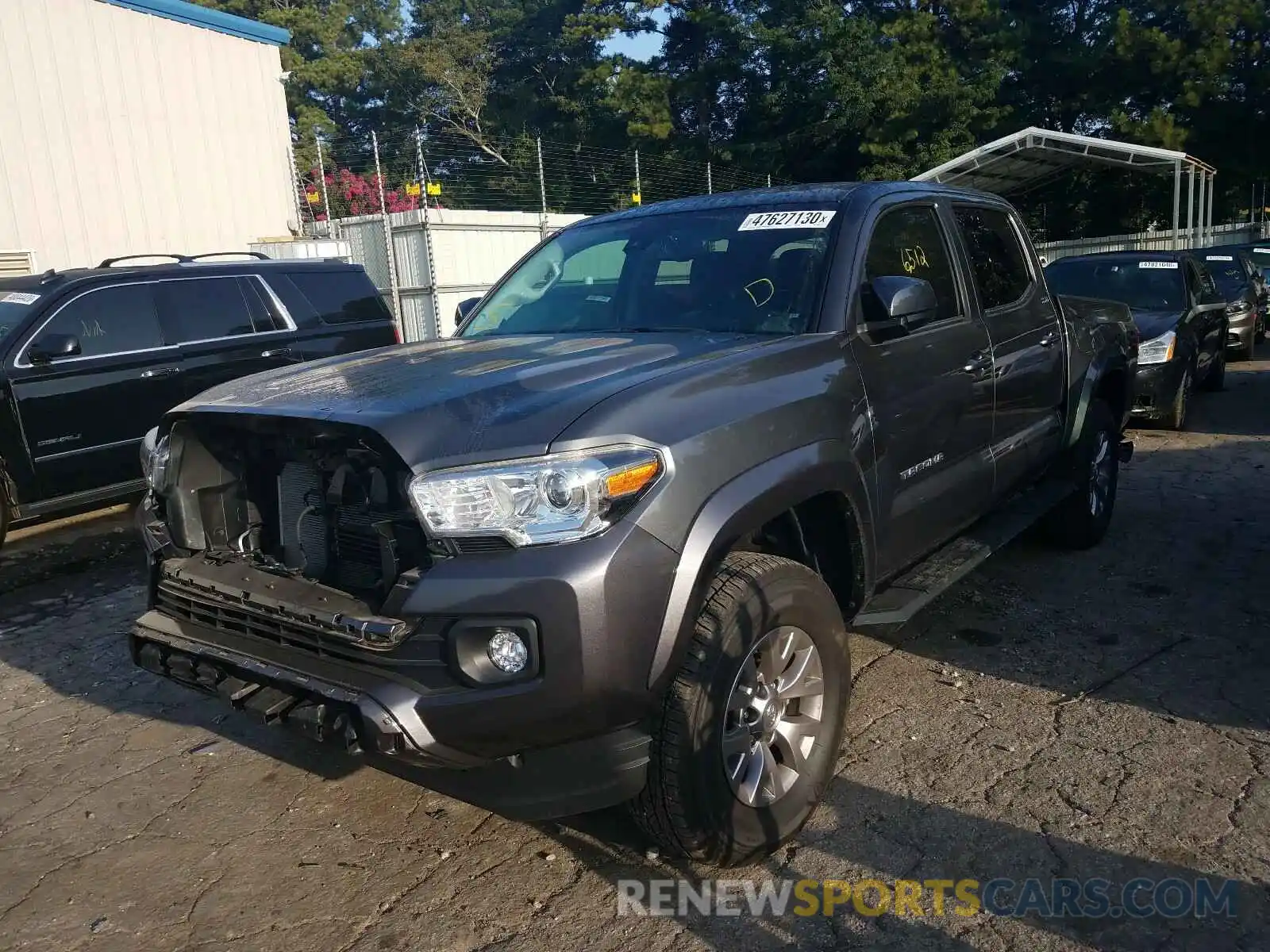 2 Photograph of a damaged car 3TMAZ5CN1KM093092 TOYOTA TACOMA 2019