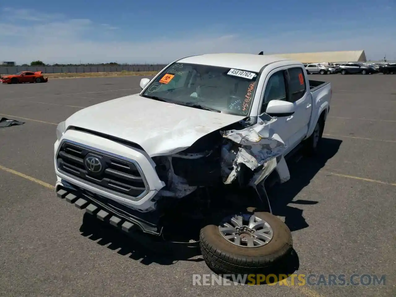 2 Photograph of a damaged car 3TMAZ5CN1KM093335 TOYOTA TACOMA 2019