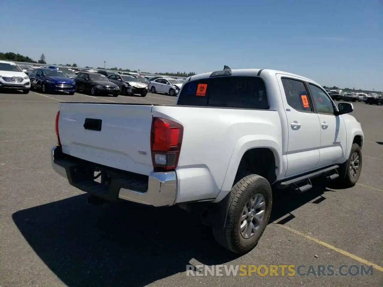 4 Photograph of a damaged car 3TMAZ5CN1KM093335 TOYOTA TACOMA 2019