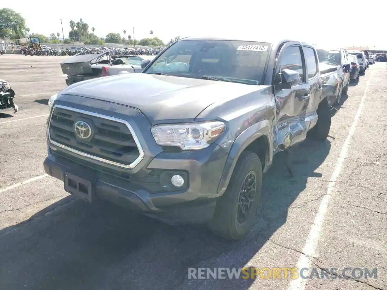 2 Photograph of a damaged car 3TMAZ5CN1KM094078 TOYOTA TACOMA 2019