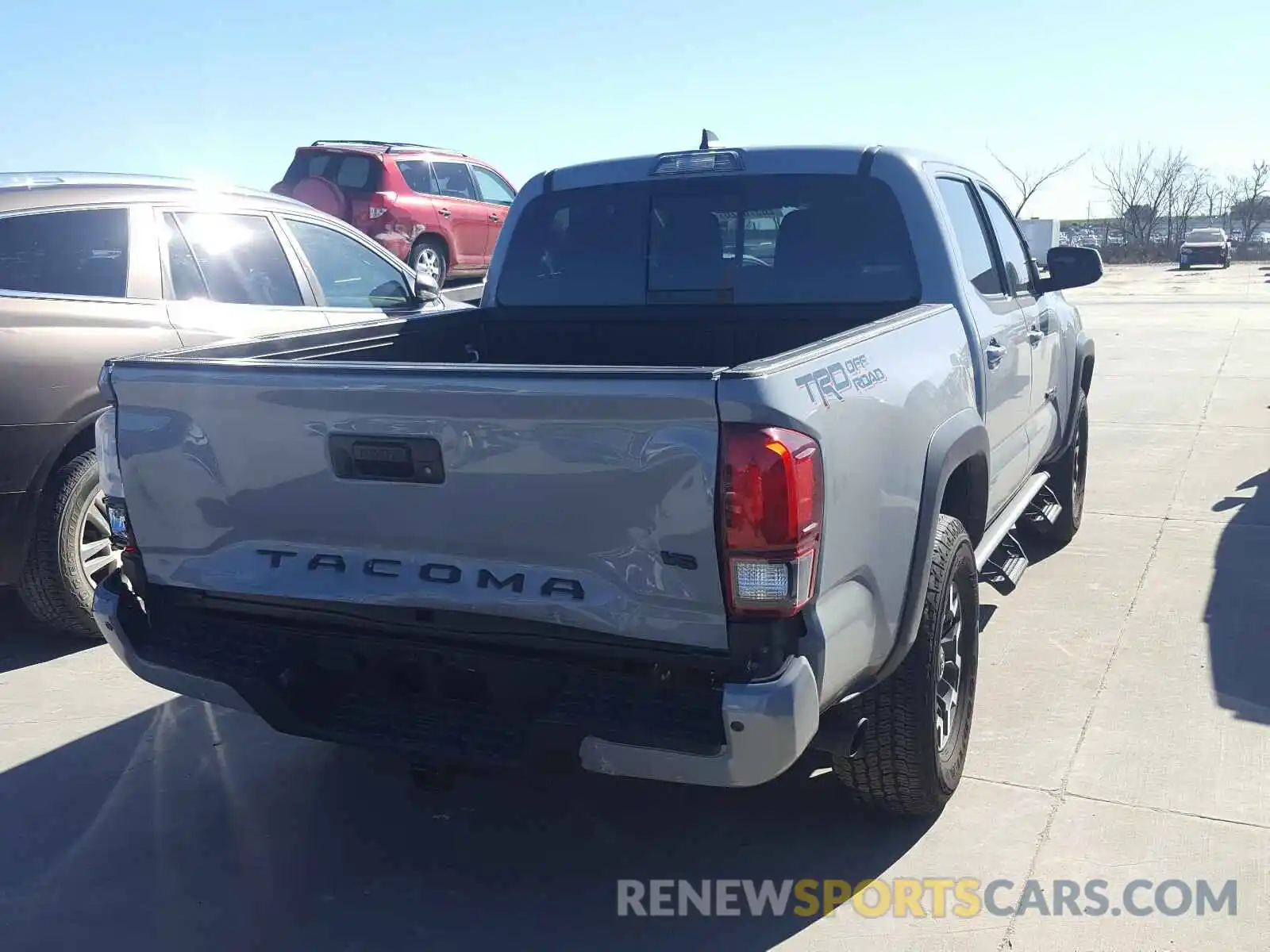 4 Photograph of a damaged car 3TMAZ5CN1KM094727 TOYOTA TACOMA 2019