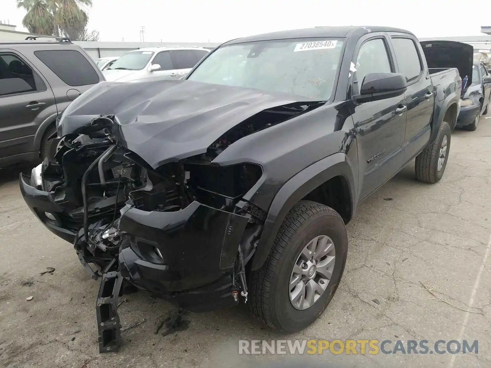 2 Photograph of a damaged car 3TMAZ5CN1KM096316 TOYOTA TACOMA 2019