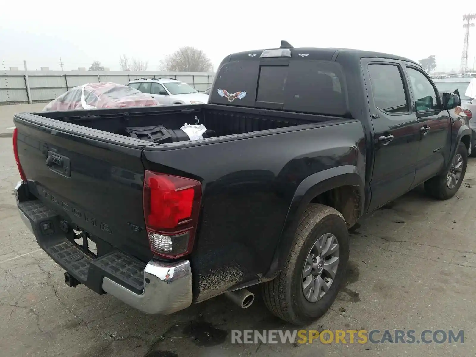 4 Photograph of a damaged car 3TMAZ5CN1KM096316 TOYOTA TACOMA 2019