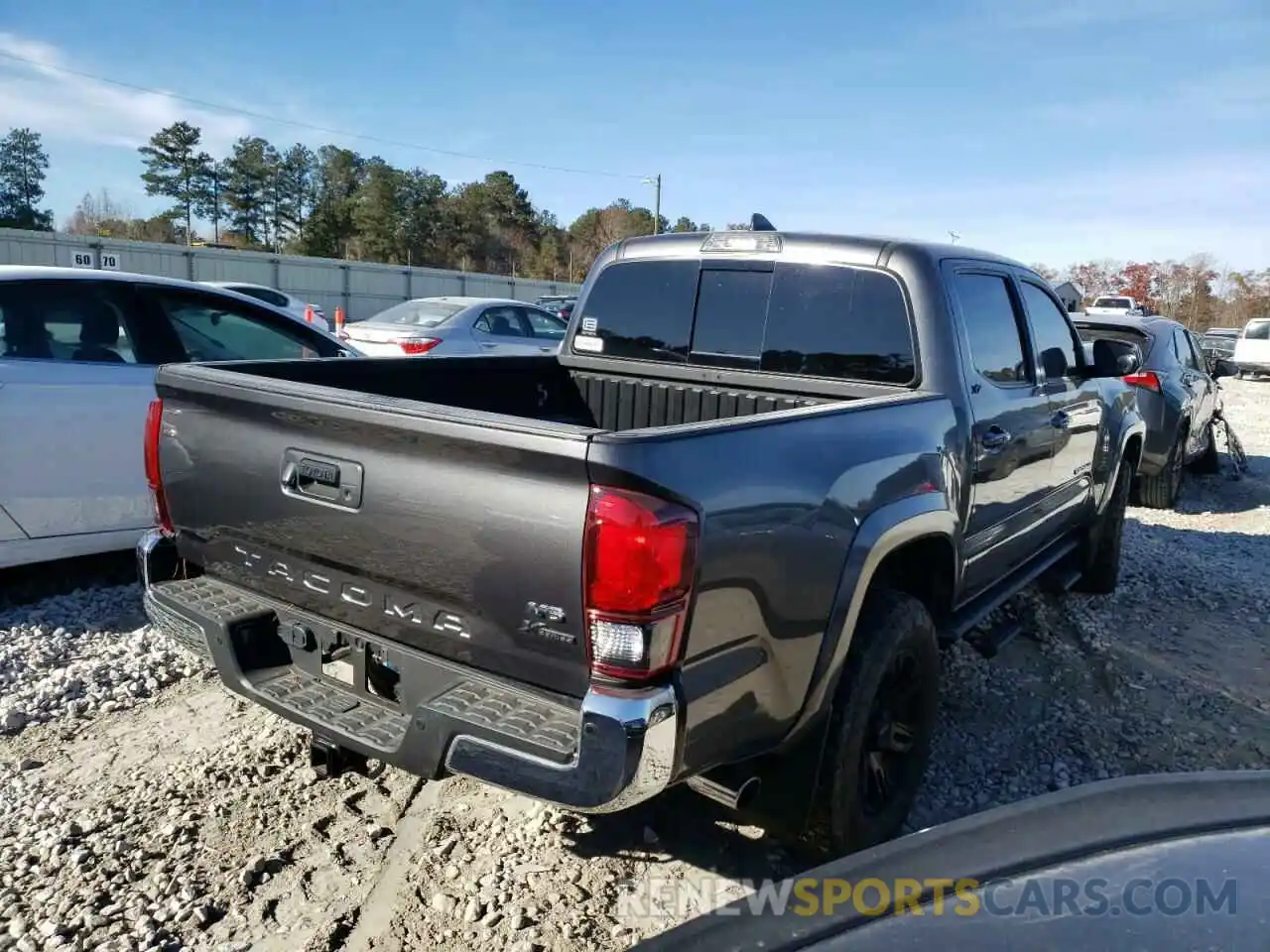 4 Photograph of a damaged car 3TMAZ5CN1KM097272 TOYOTA TACOMA 2019