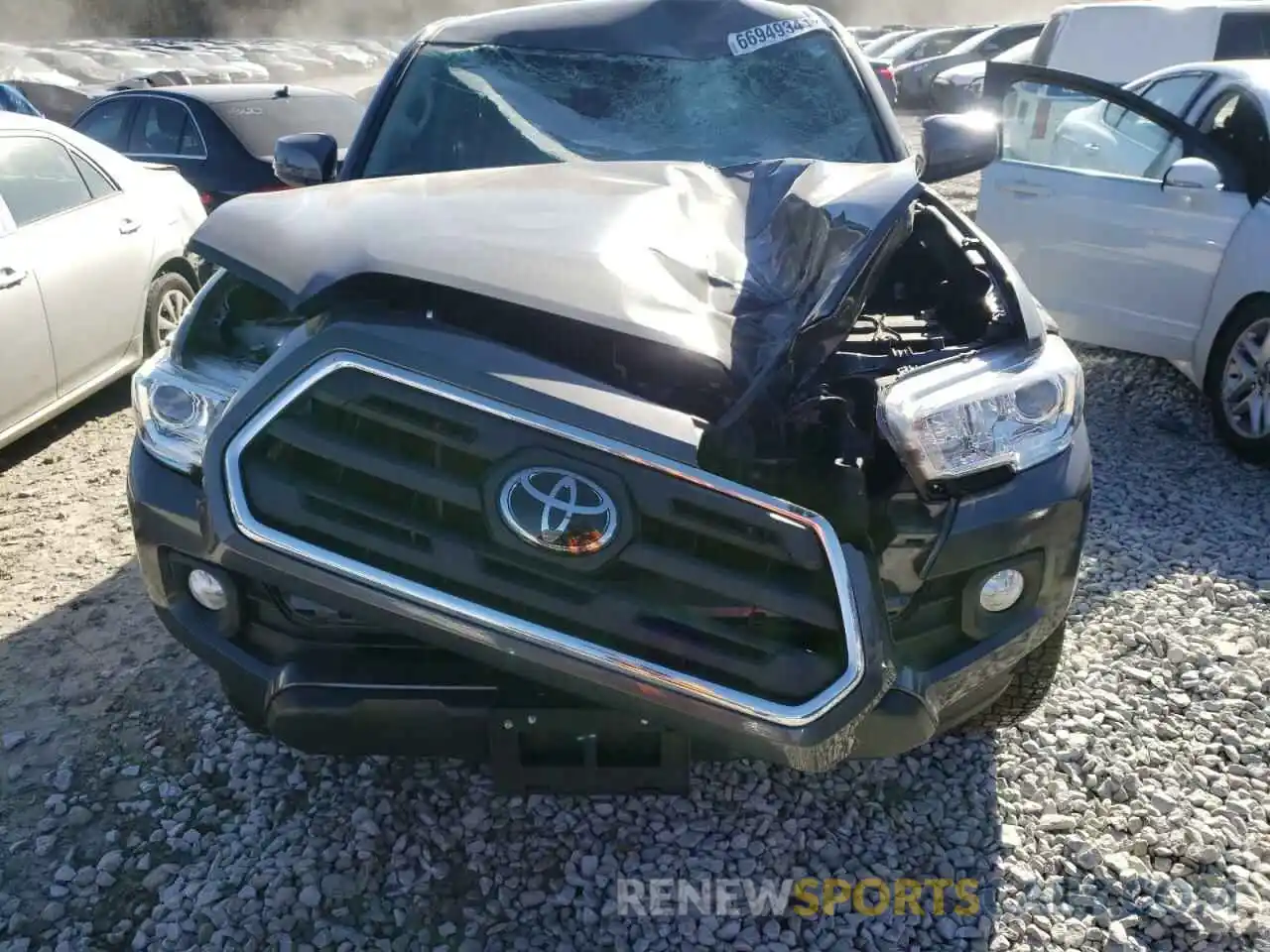 7 Photograph of a damaged car 3TMAZ5CN1KM097272 TOYOTA TACOMA 2019