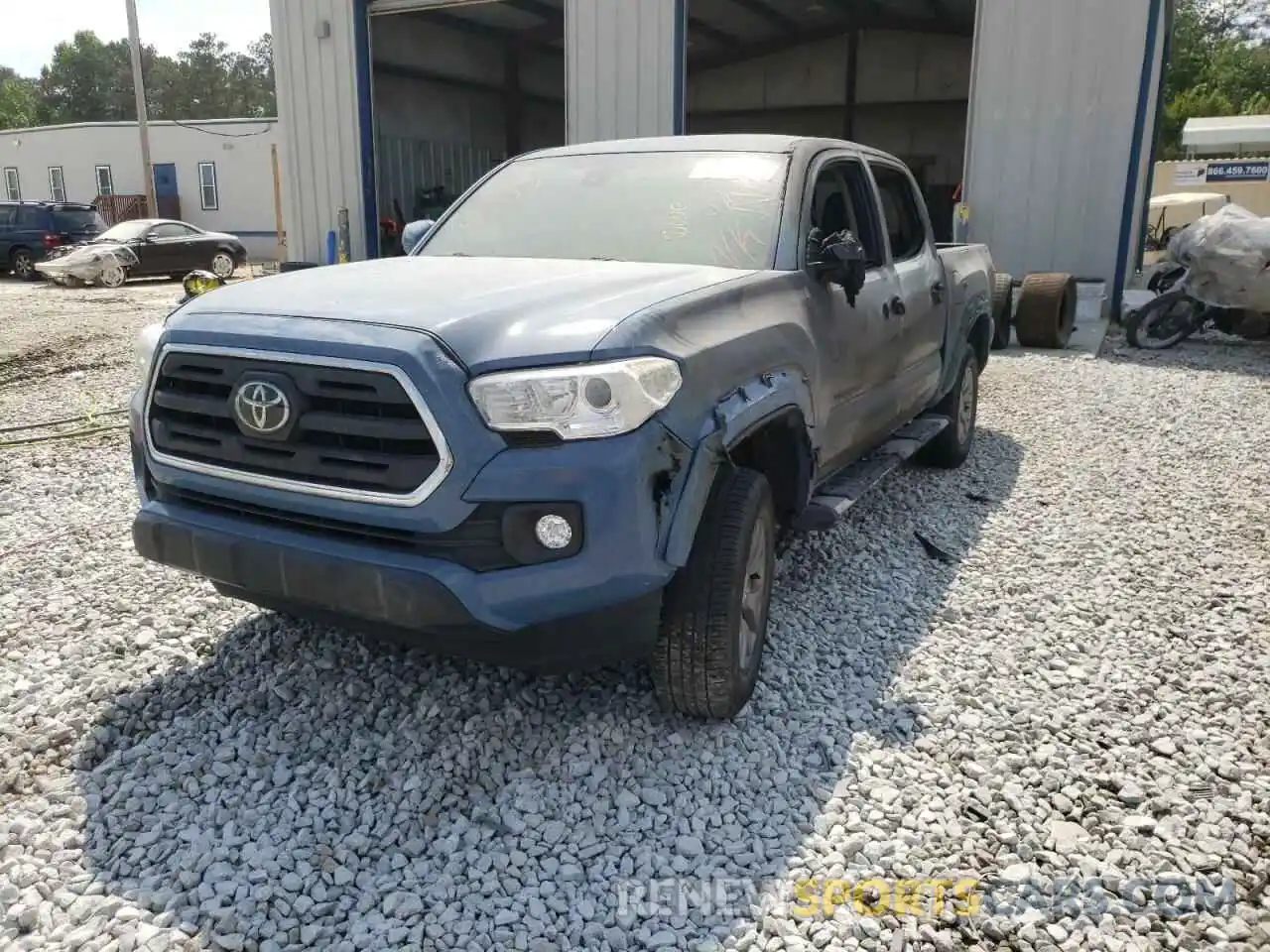 2 Photograph of a damaged car 3TMAZ5CN1KM097367 TOYOTA TACOMA 2019