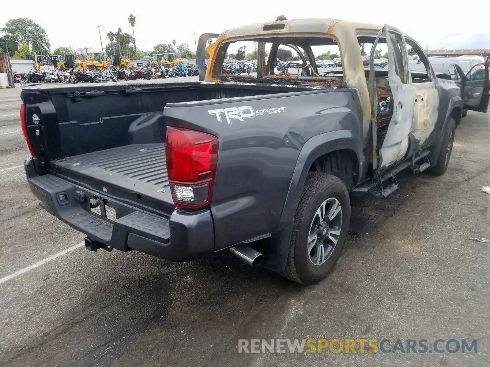 4 Photograph of a damaged car 3TMAZ5CN1KM098244 TOYOTA TACOMA 2019