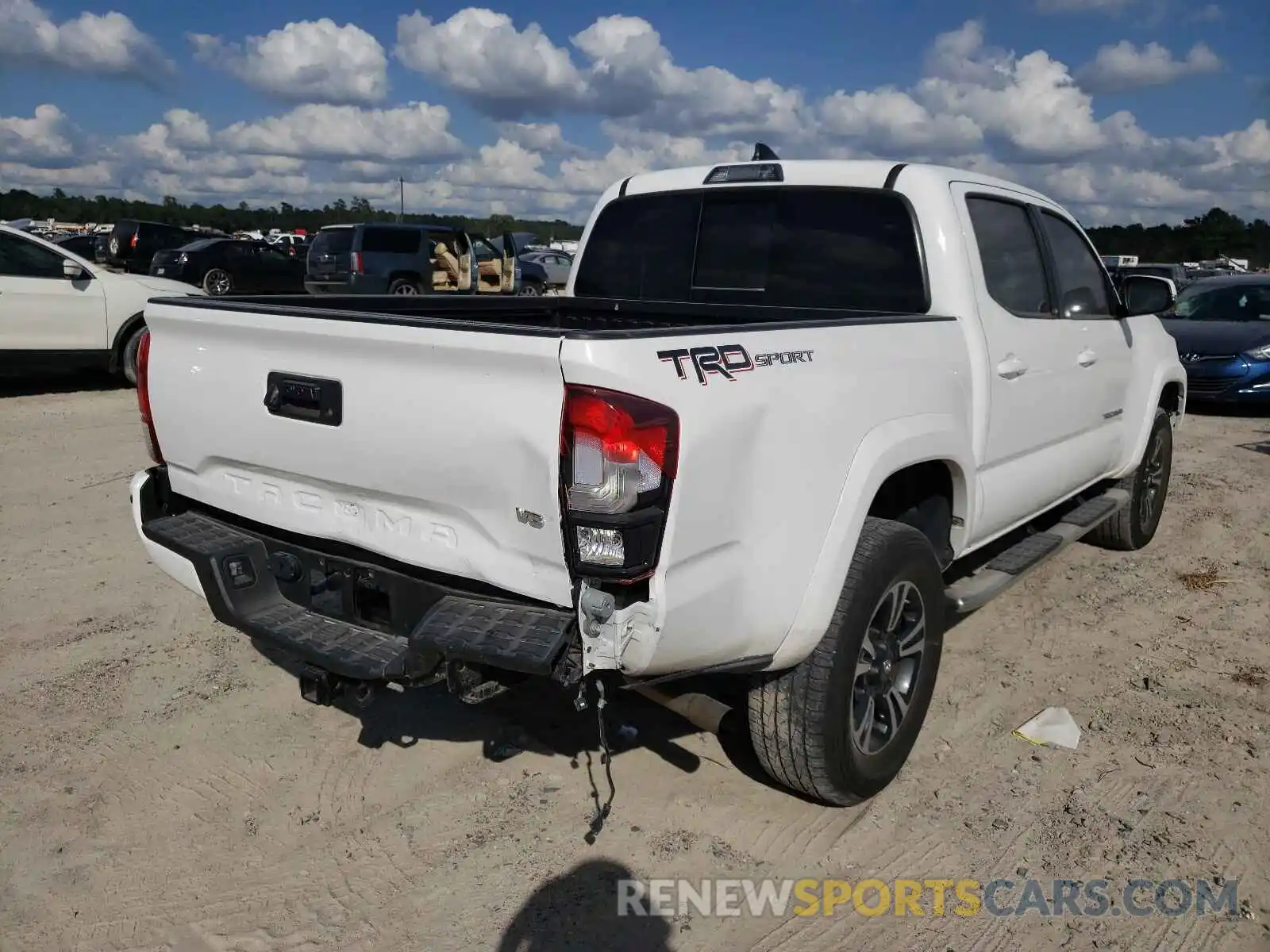 4 Photograph of a damaged car 3TMAZ5CN1KM099992 TOYOTA TACOMA 2019