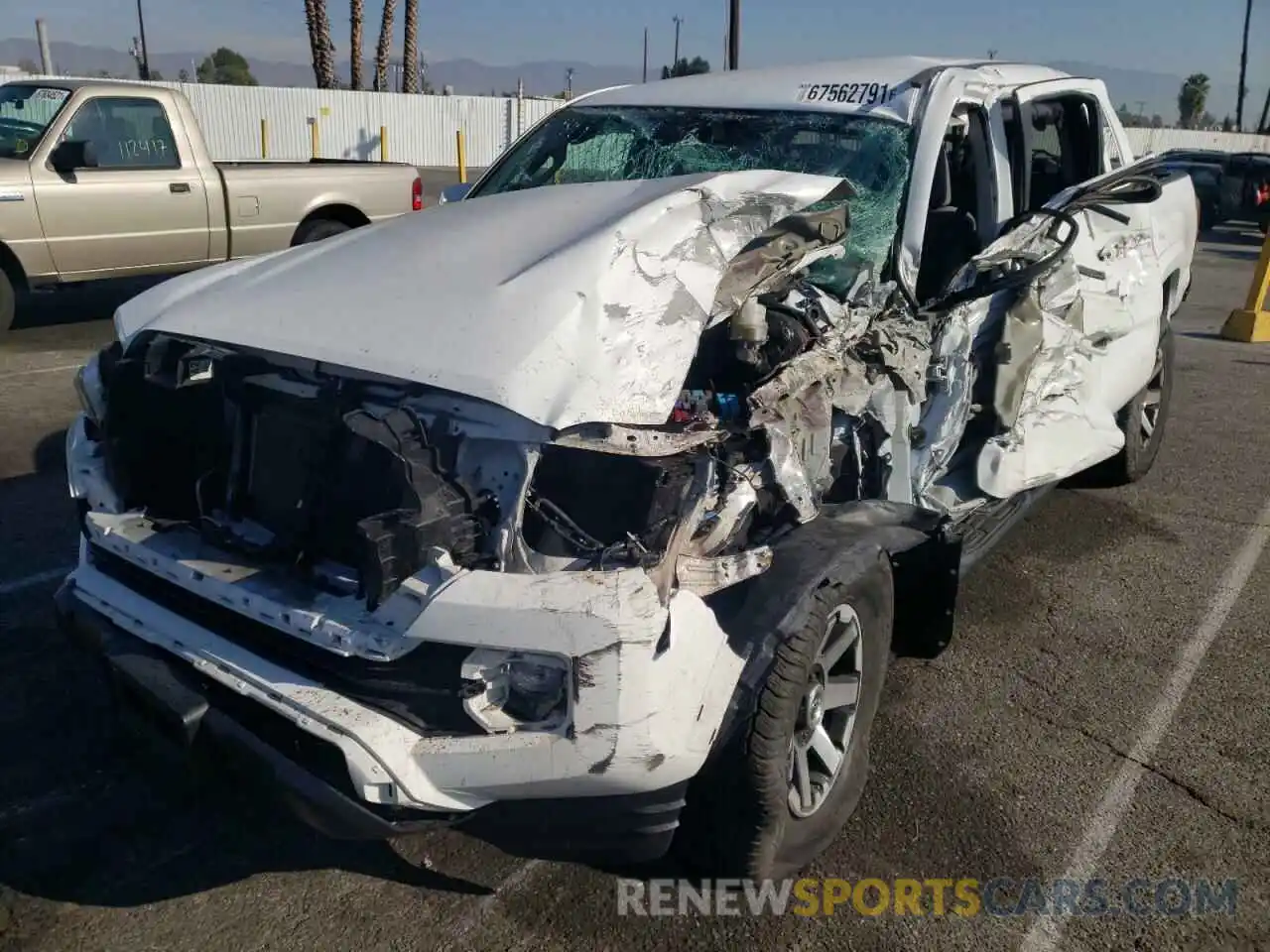 2 Photograph of a damaged car 3TMAZ5CN1KM100705 TOYOTA TACOMA 2019