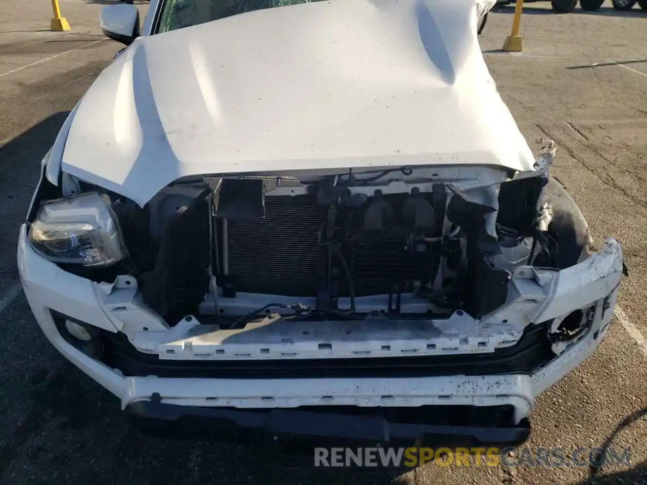 7 Photograph of a damaged car 3TMAZ5CN1KM100705 TOYOTA TACOMA 2019