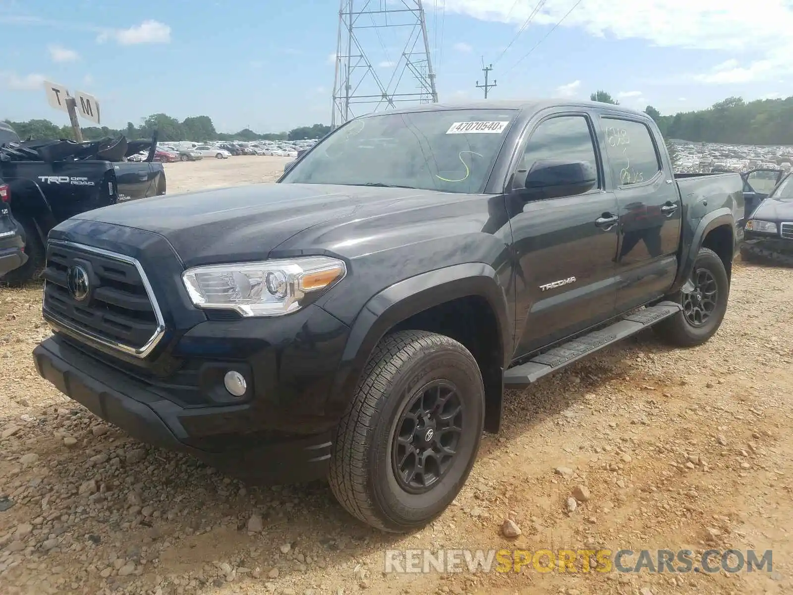 2 Photograph of a damaged car 3TMAZ5CN1KM102941 TOYOTA TACOMA 2019