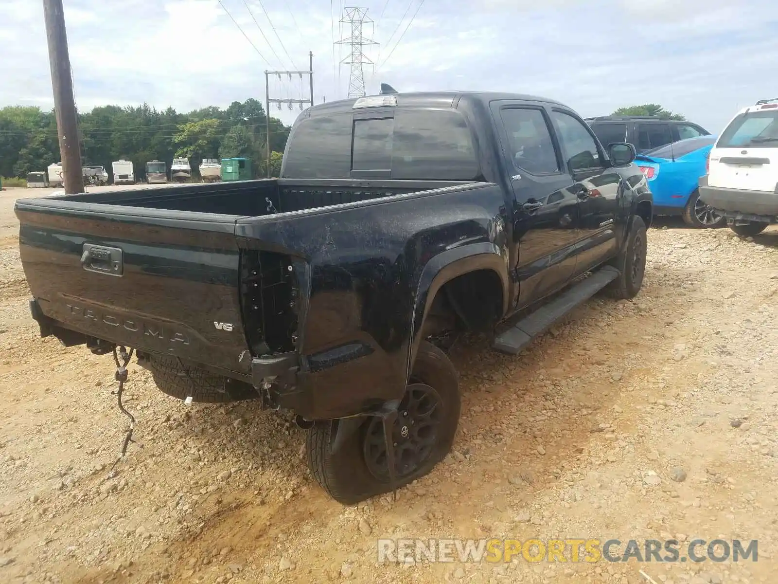 4 Photograph of a damaged car 3TMAZ5CN1KM102941 TOYOTA TACOMA 2019