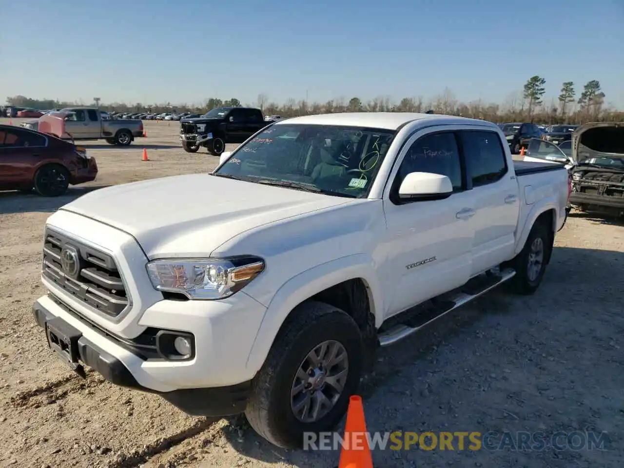 2 Photograph of a damaged car 3TMAZ5CN1KM104818 TOYOTA TACOMA 2019