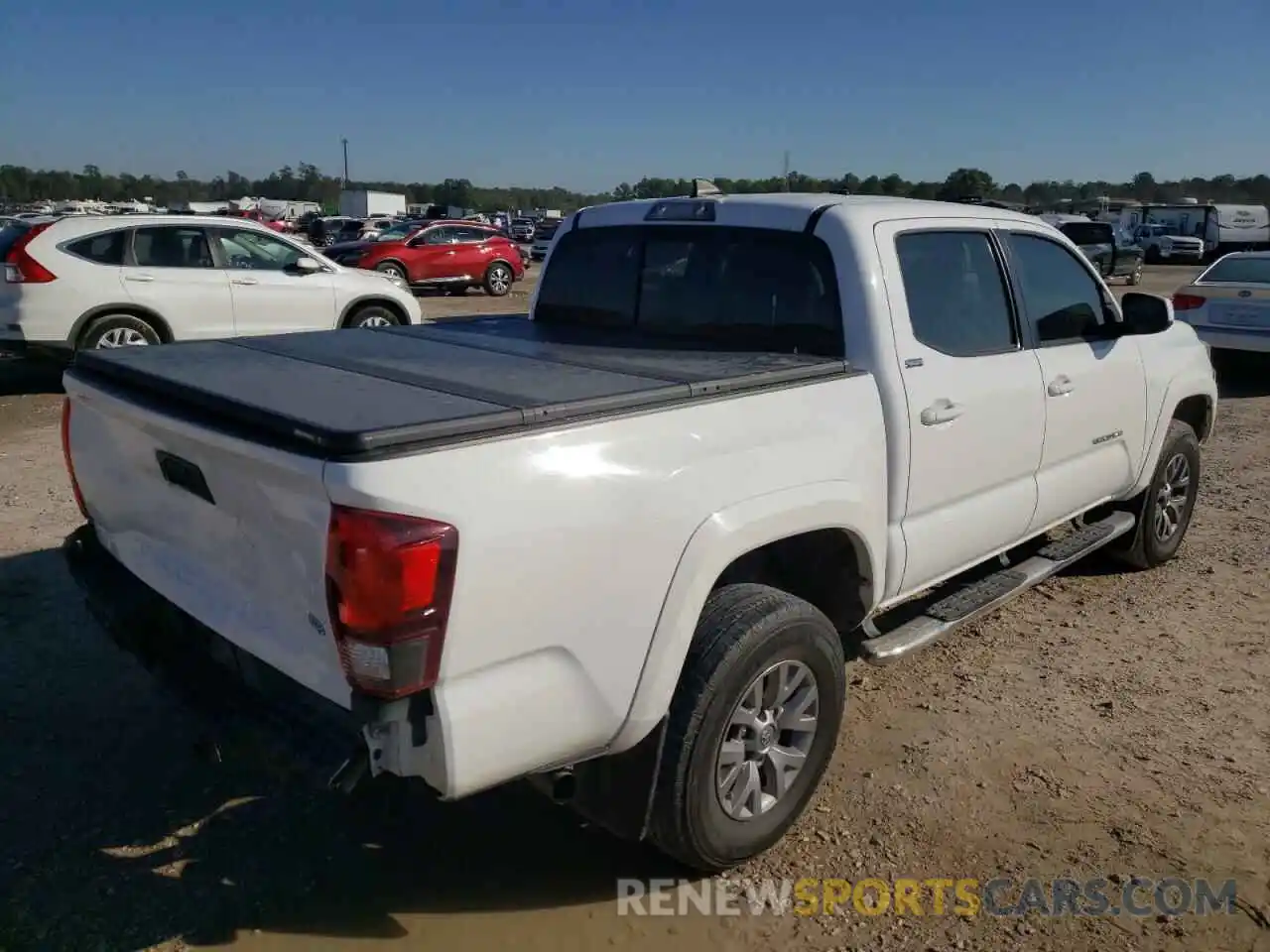 4 Photograph of a damaged car 3TMAZ5CN1KM104818 TOYOTA TACOMA 2019