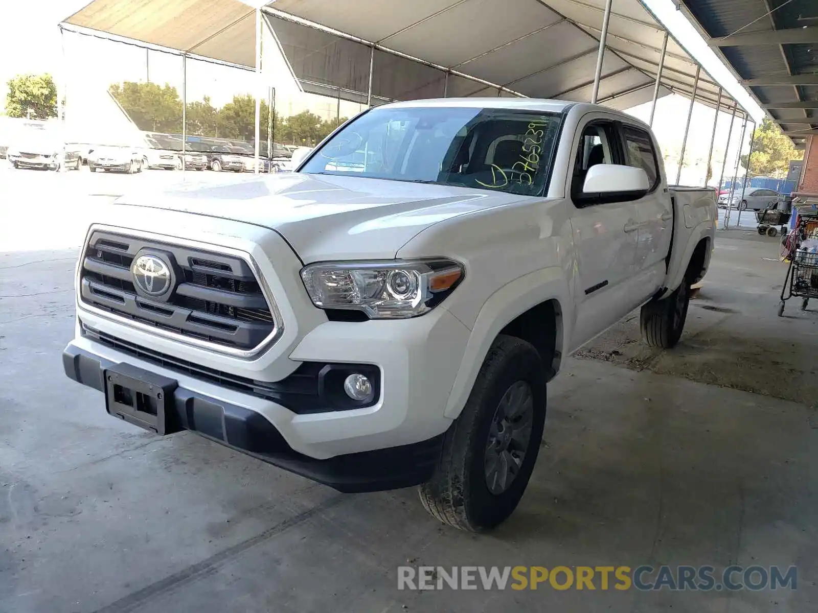 2 Photograph of a damaged car 3TMAZ5CN1KM105192 TOYOTA TACOMA 2019