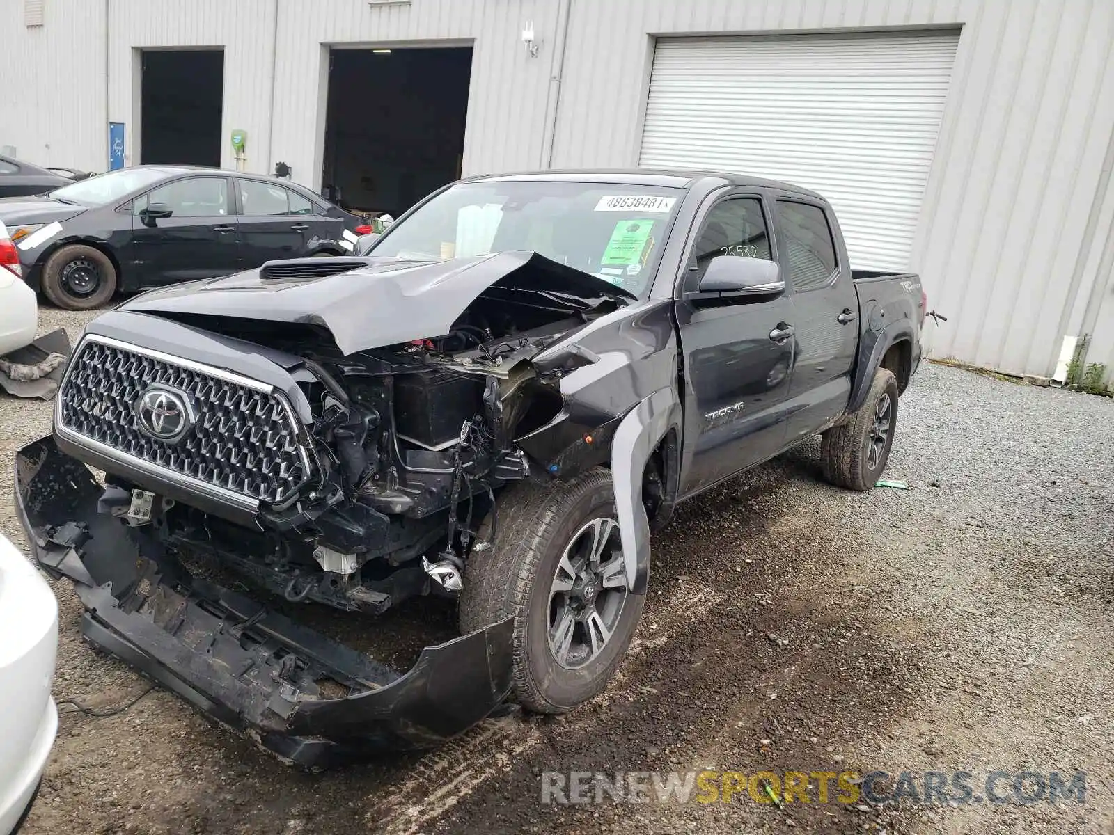 2 Photograph of a damaged car 3TMAZ5CN1KM106214 TOYOTA TACOMA 2019