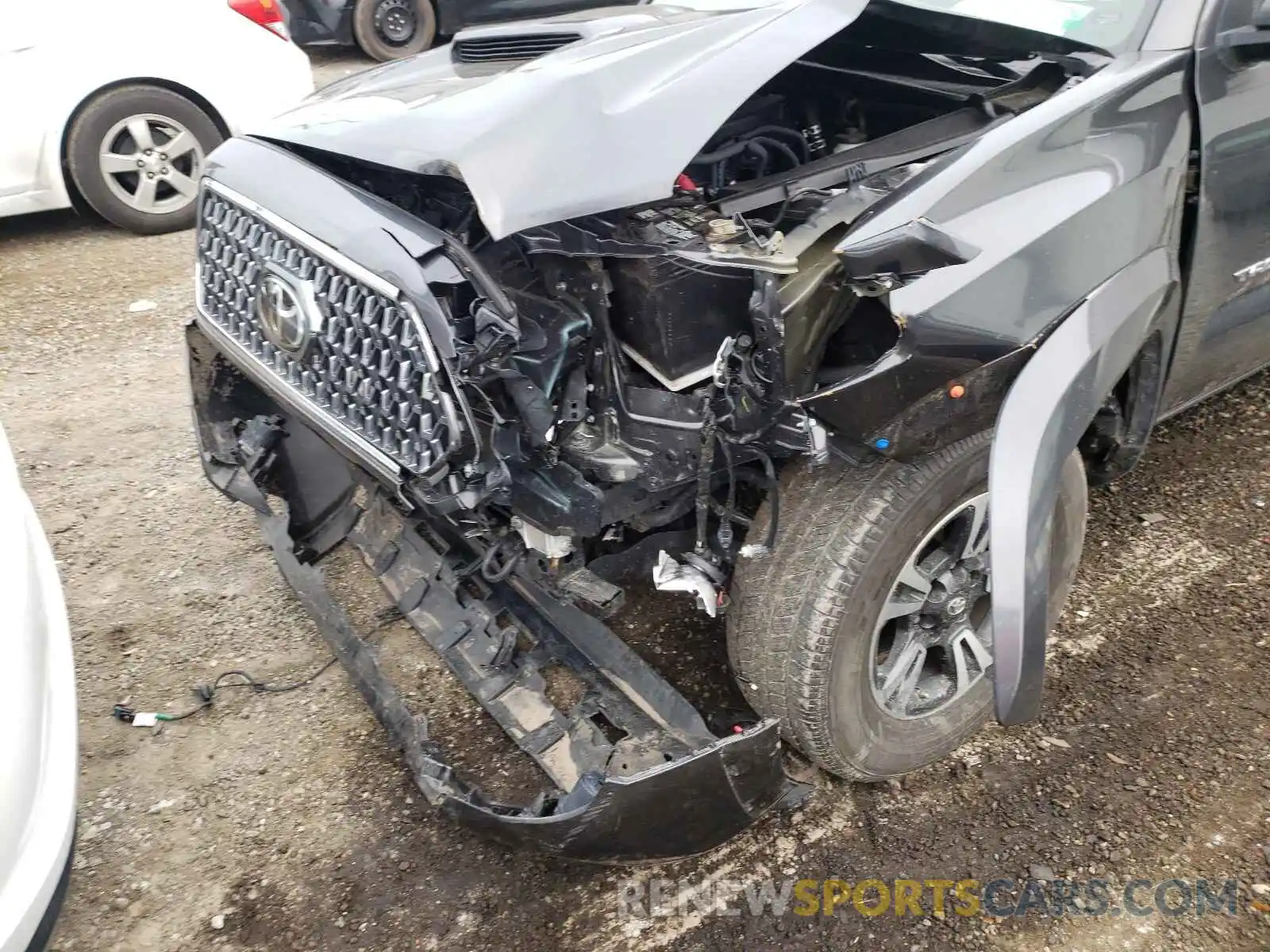 9 Photograph of a damaged car 3TMAZ5CN1KM106214 TOYOTA TACOMA 2019