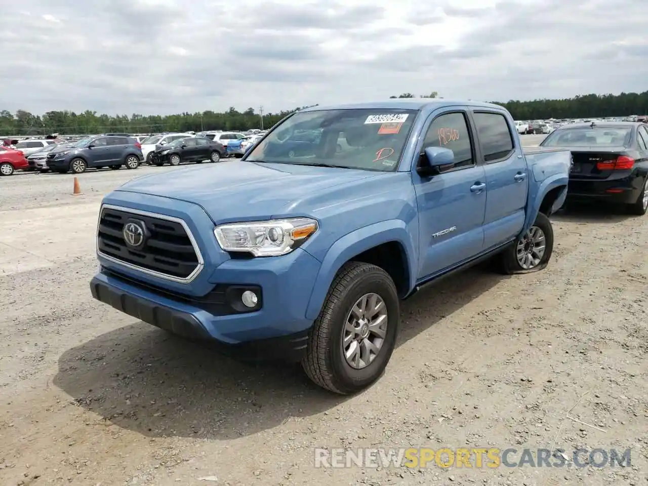 2 Photograph of a damaged car 3TMAZ5CN1KM106536 TOYOTA TACOMA 2019