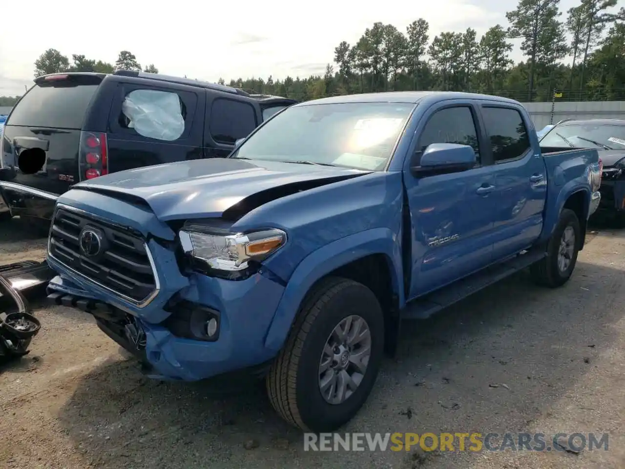 2 Photograph of a damaged car 3TMAZ5CN1KM108108 TOYOTA TACOMA 2019