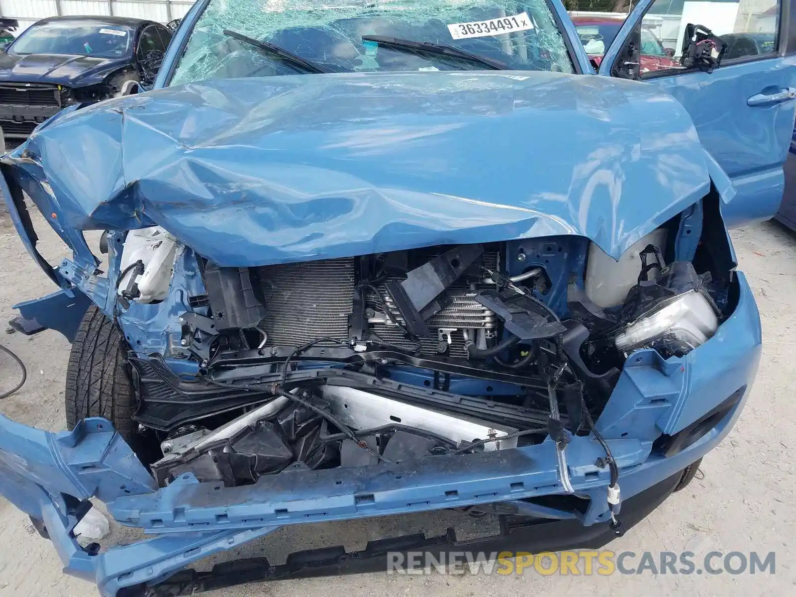 7 Photograph of a damaged car 3TMAZ5CN1KM112384 TOYOTA TACOMA 2019