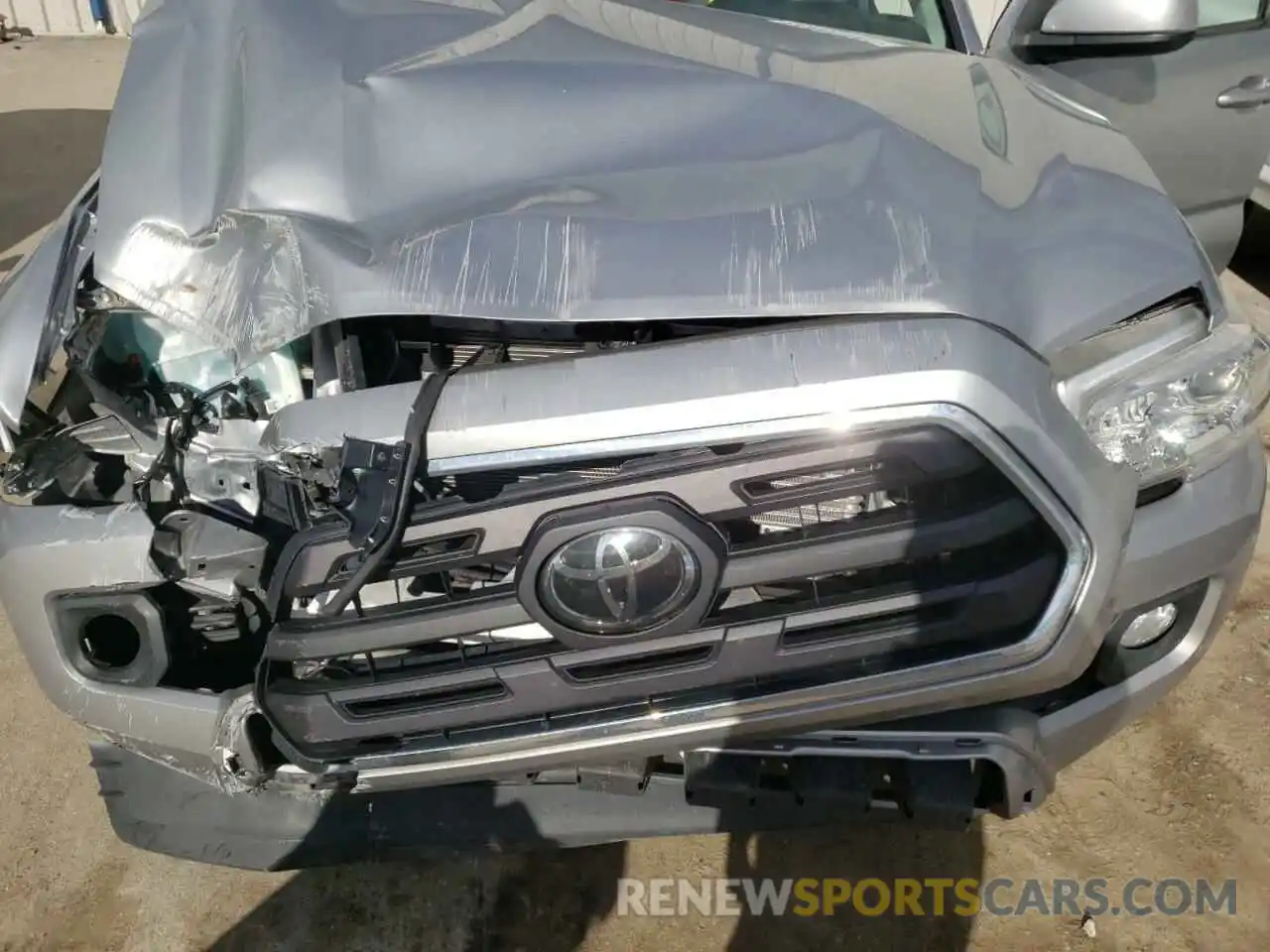 7 Photograph of a damaged car 3TMAZ5CN1KM112465 TOYOTA TACOMA 2019