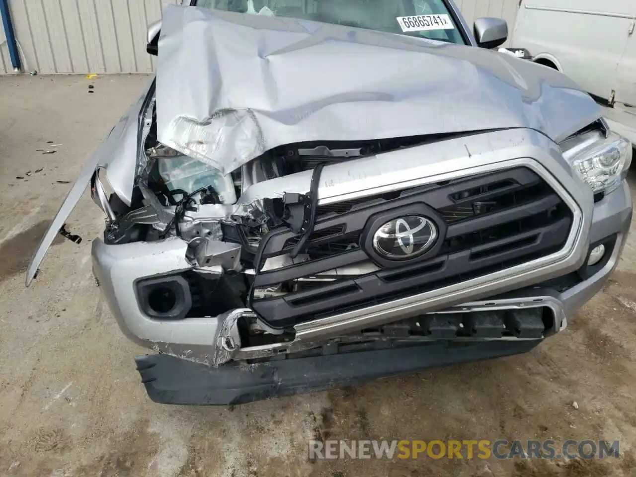 9 Photograph of a damaged car 3TMAZ5CN1KM112465 TOYOTA TACOMA 2019