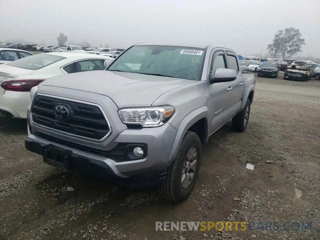 2 Photograph of a damaged car 3TMAZ5CN2KM079993 TOYOTA TACOMA 2019