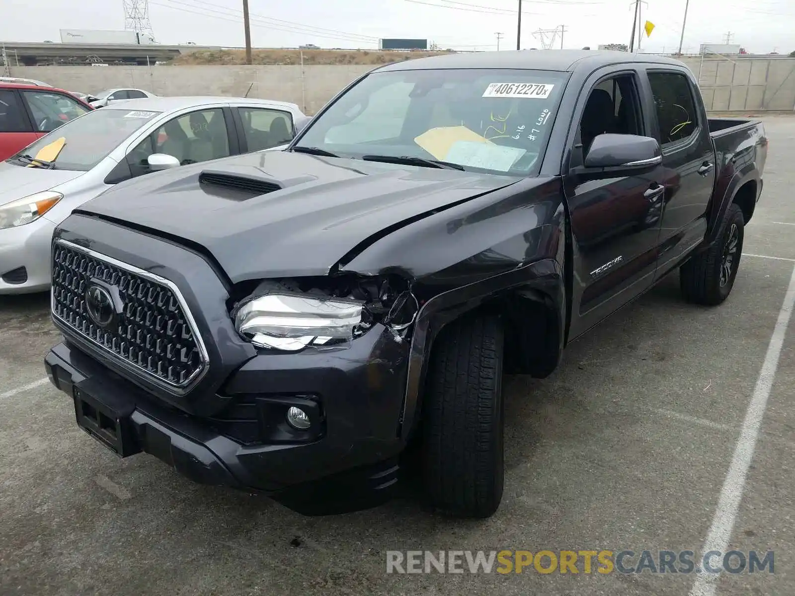 2 Photograph of a damaged car 3TMAZ5CN2KM080108 TOYOTA TACOMA 2019