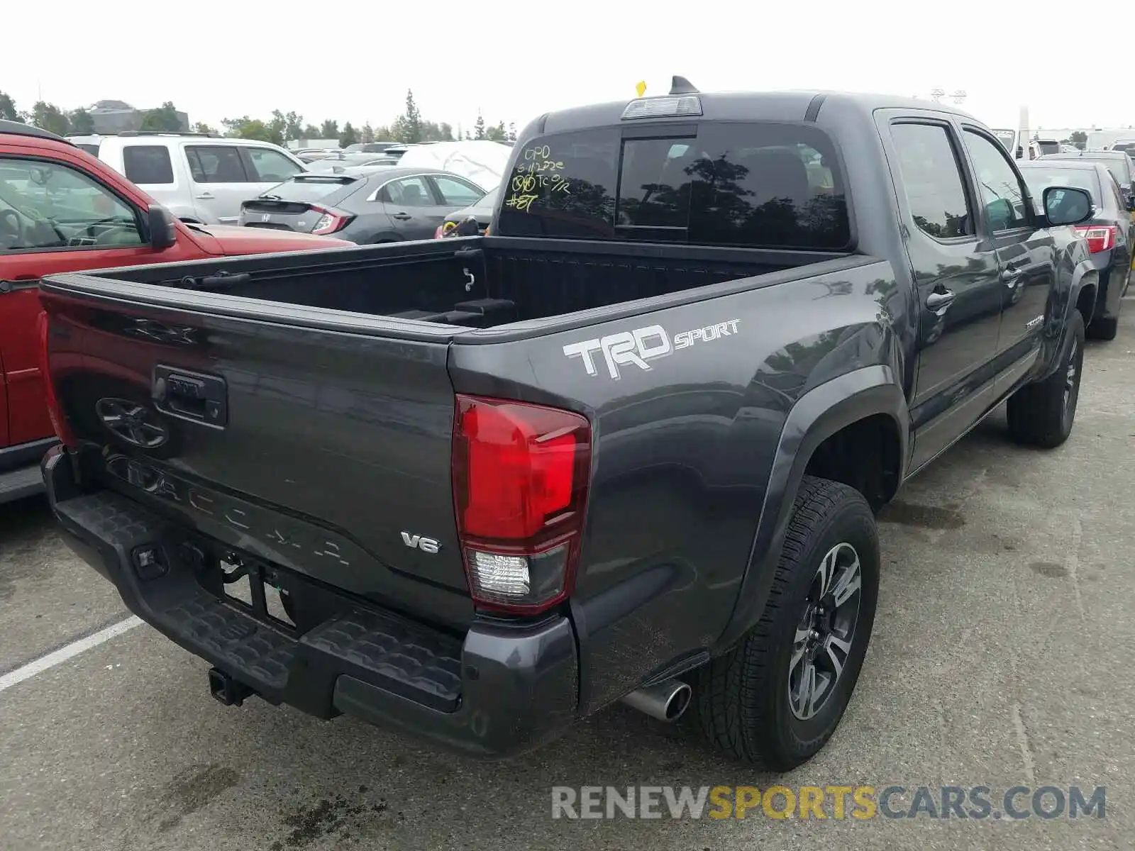 4 Photograph of a damaged car 3TMAZ5CN2KM080108 TOYOTA TACOMA 2019