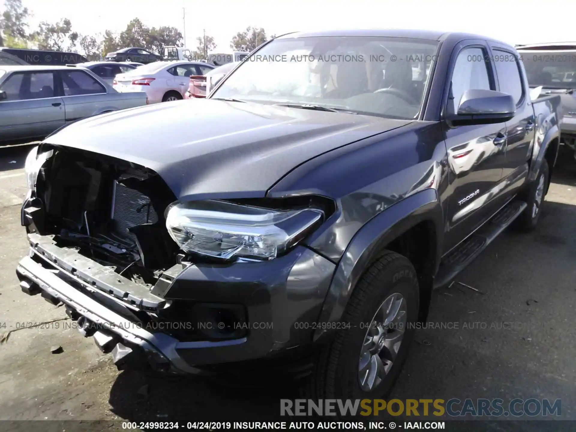 2 Photograph of a damaged car 3TMAZ5CN2KM082599 TOYOTA TACOMA 2019