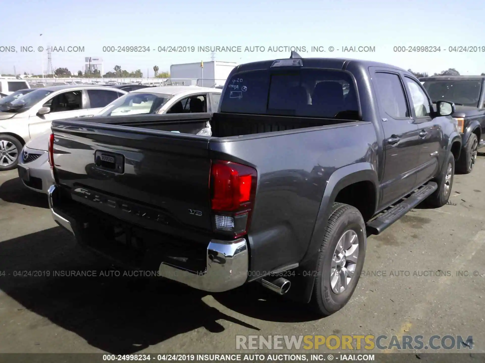 4 Photograph of a damaged car 3TMAZ5CN2KM082599 TOYOTA TACOMA 2019