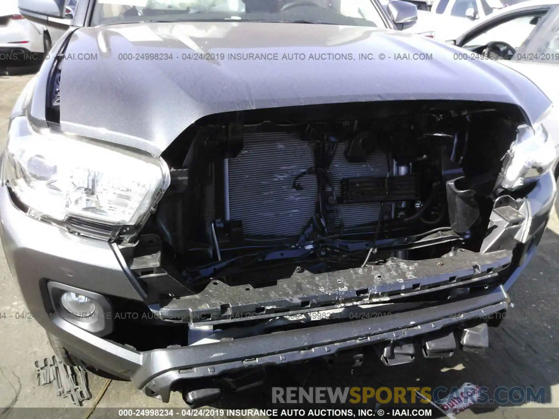 6 Photograph of a damaged car 3TMAZ5CN2KM082599 TOYOTA TACOMA 2019