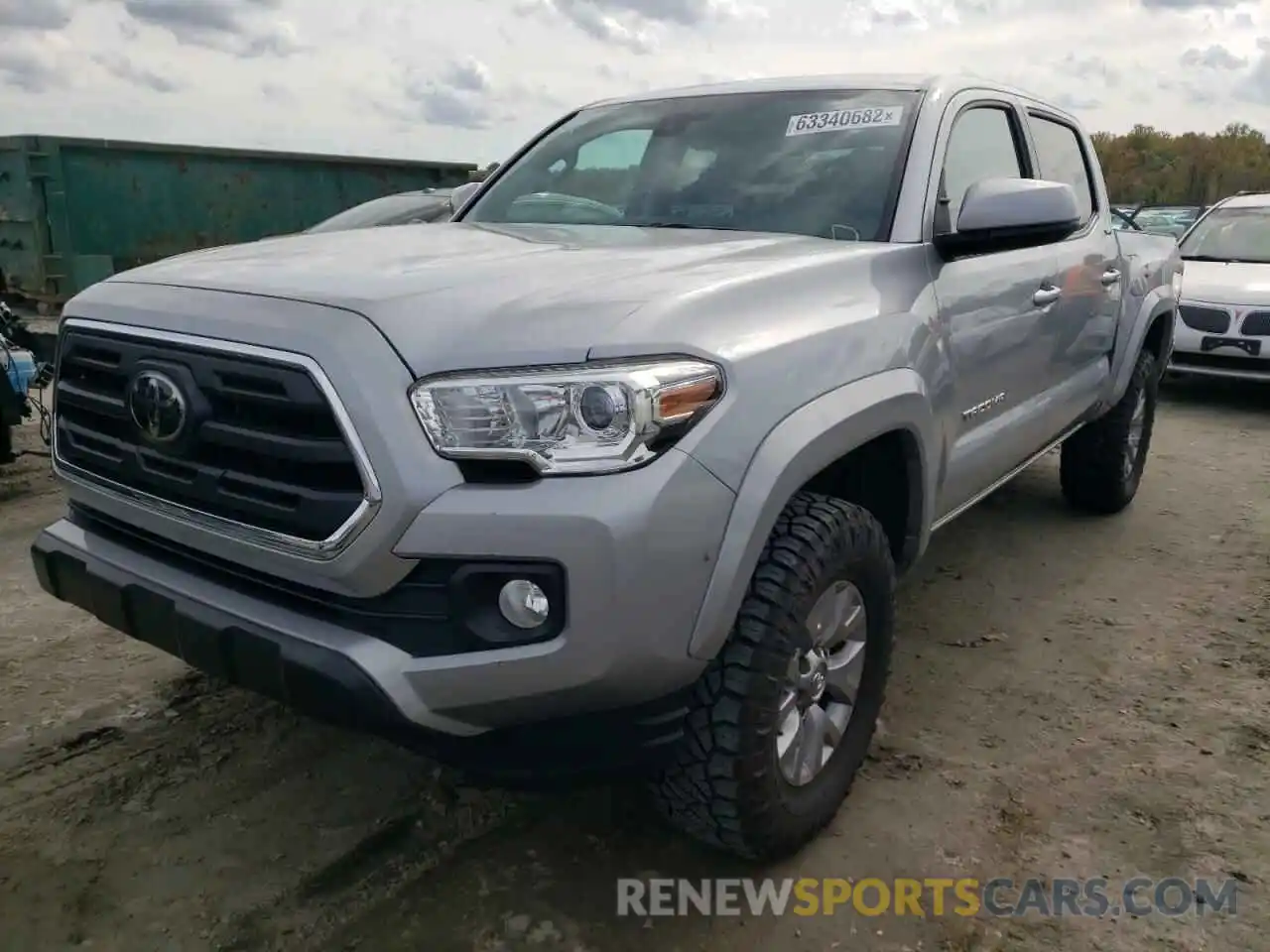 2 Photograph of a damaged car 3TMAZ5CN2KM090458 TOYOTA TACOMA 2019