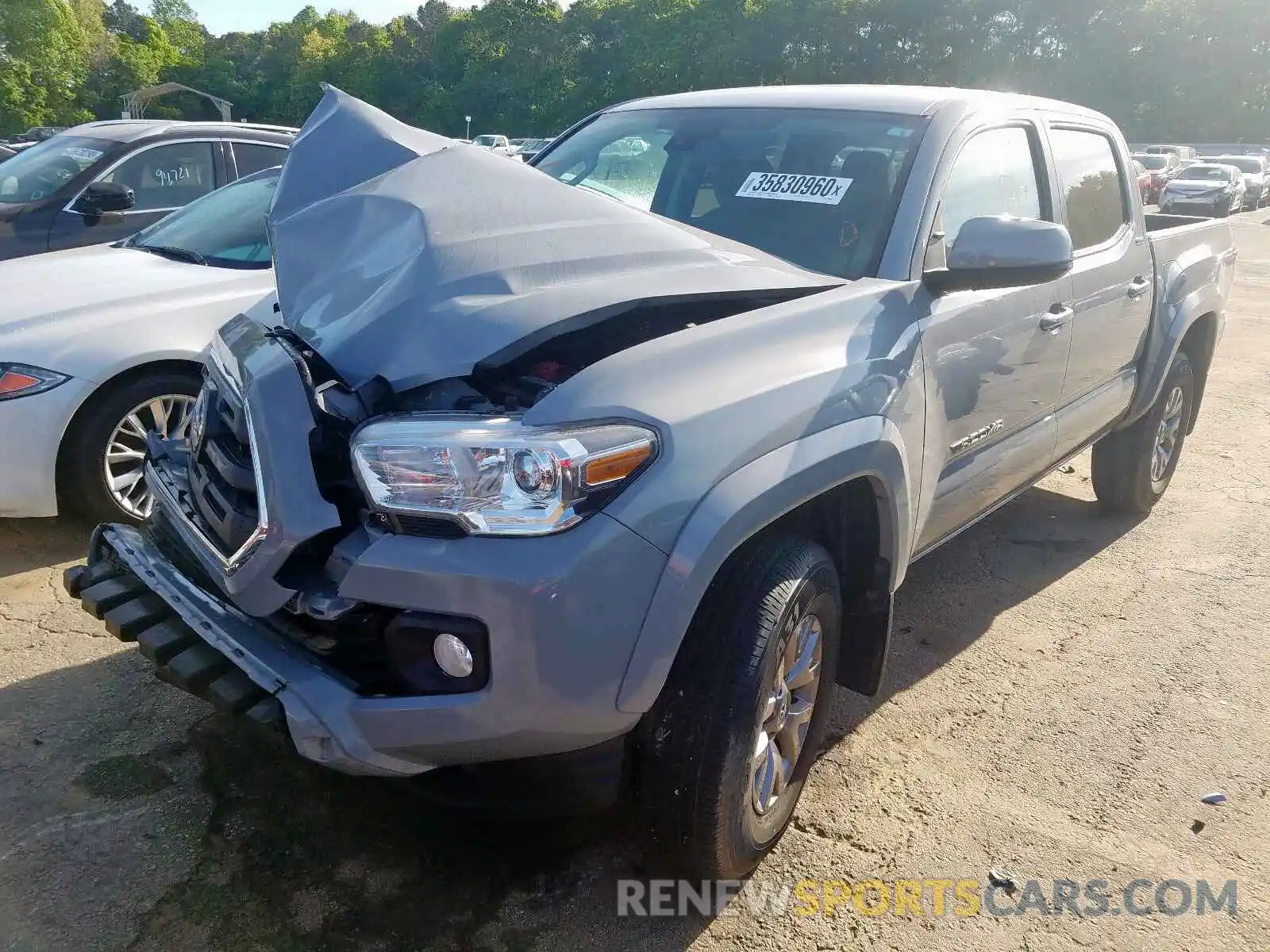 2 Photograph of a damaged car 3TMAZ5CN2KM090461 TOYOTA TACOMA 2019