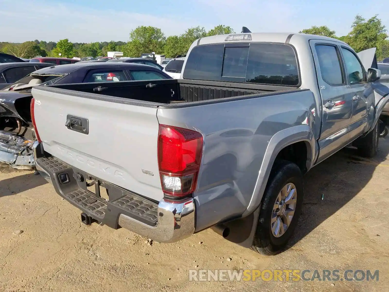 4 Photograph of a damaged car 3TMAZ5CN2KM090461 TOYOTA TACOMA 2019