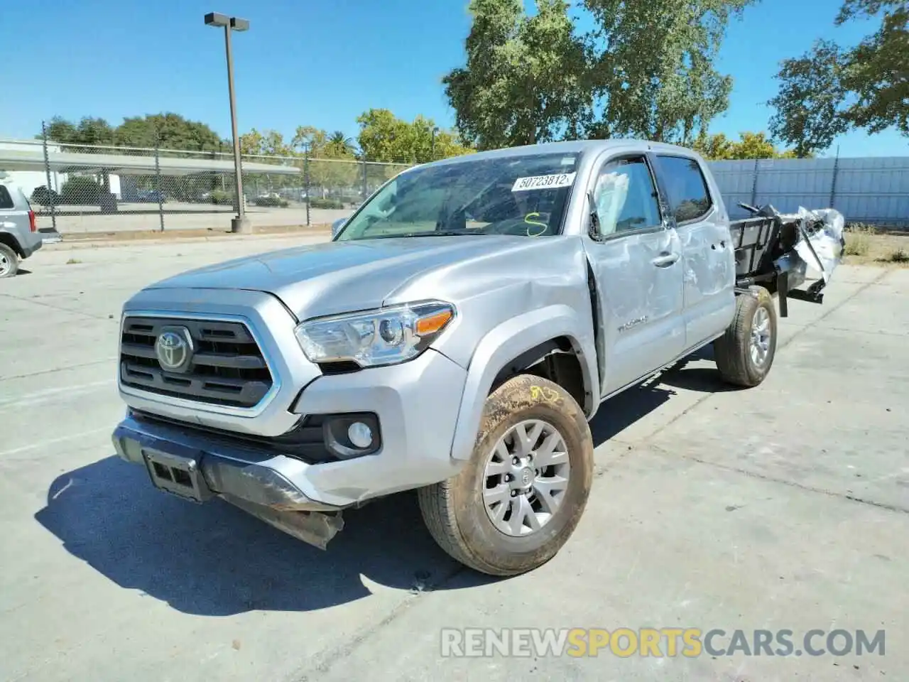 2 Photograph of a damaged car 3TMAZ5CN2KM093327 TOYOTA TACOMA 2019