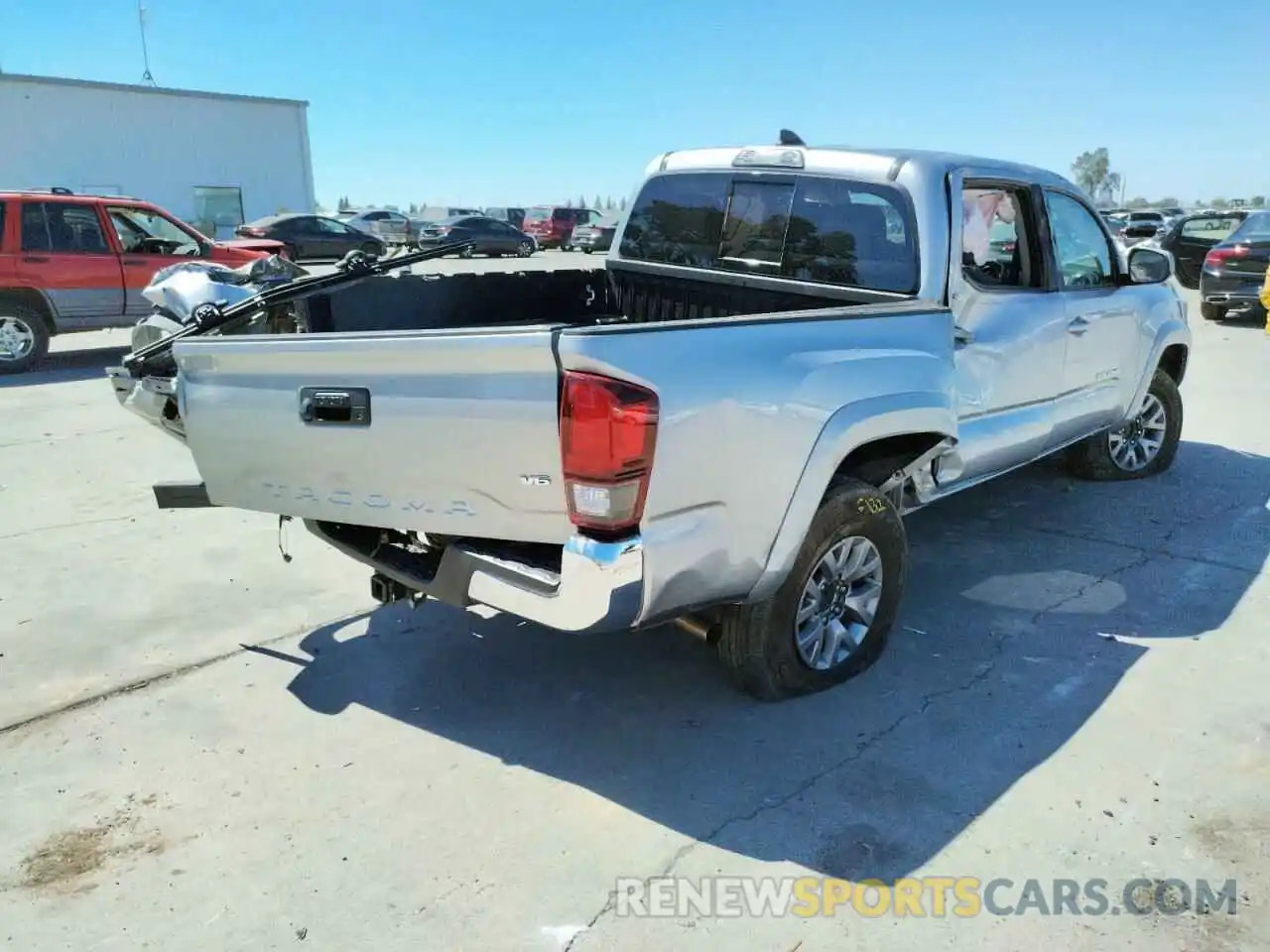 4 Photograph of a damaged car 3TMAZ5CN2KM093327 TOYOTA TACOMA 2019