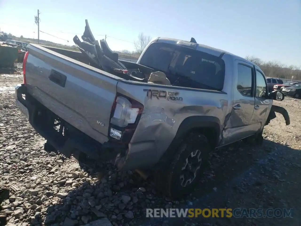 4 Photograph of a damaged car 3TMAZ5CN2KM095496 TOYOTA TACOMA 2019