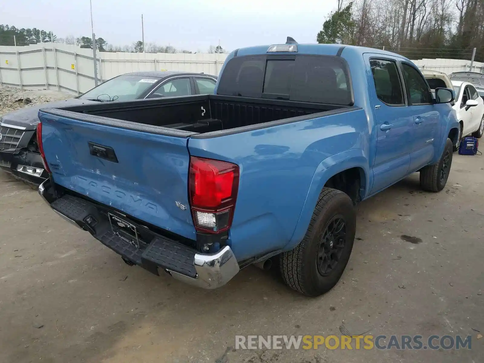 4 Photograph of a damaged car 3TMAZ5CN2KM095675 TOYOTA TACOMA 2019