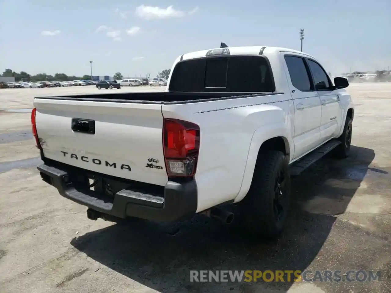 4 Photograph of a damaged car 3TMAZ5CN2KM095806 TOYOTA TACOMA 2019