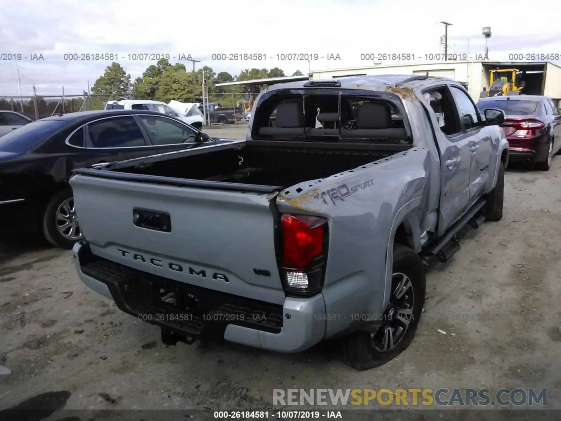 4 Photograph of a damaged car 3TMAZ5CN2KM095823 TOYOTA TACOMA 2019