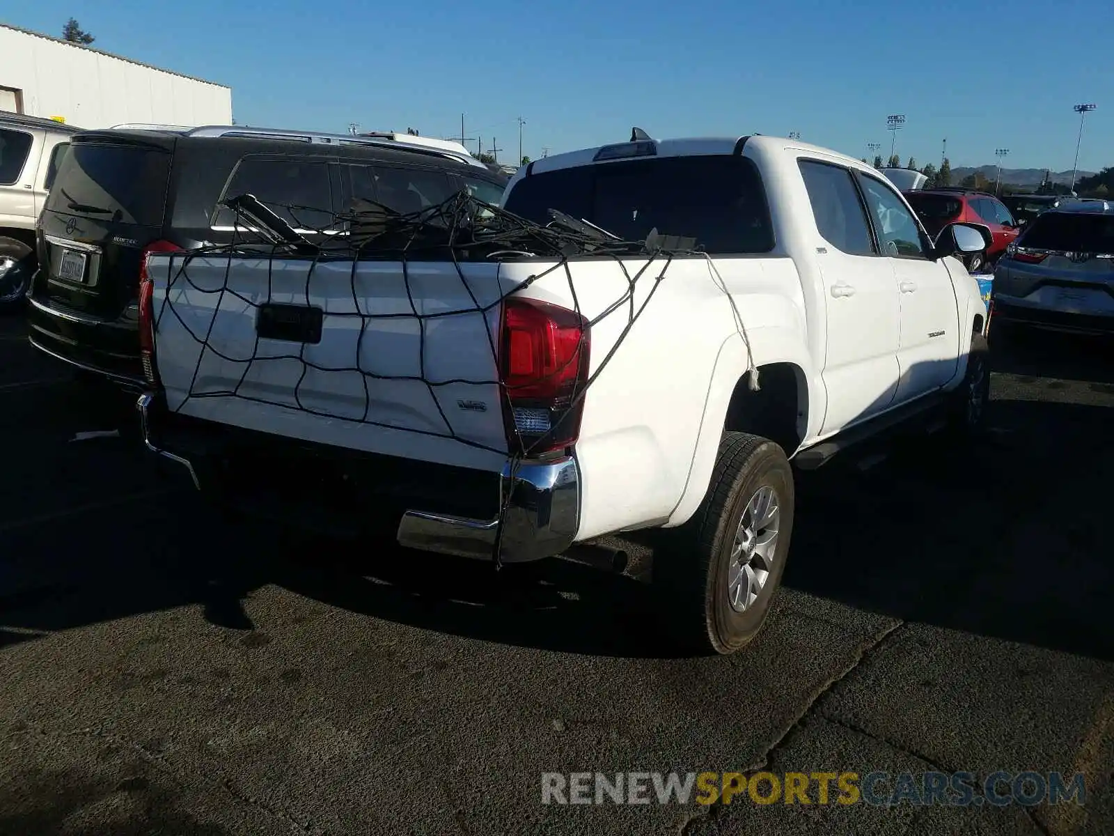 4 Photograph of a damaged car 3TMAZ5CN2KM097216 TOYOTA TACOMA 2019