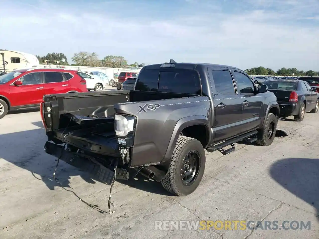 4 Photograph of a damaged car 3TMAZ5CN2KM099371 TOYOTA TACOMA 2019