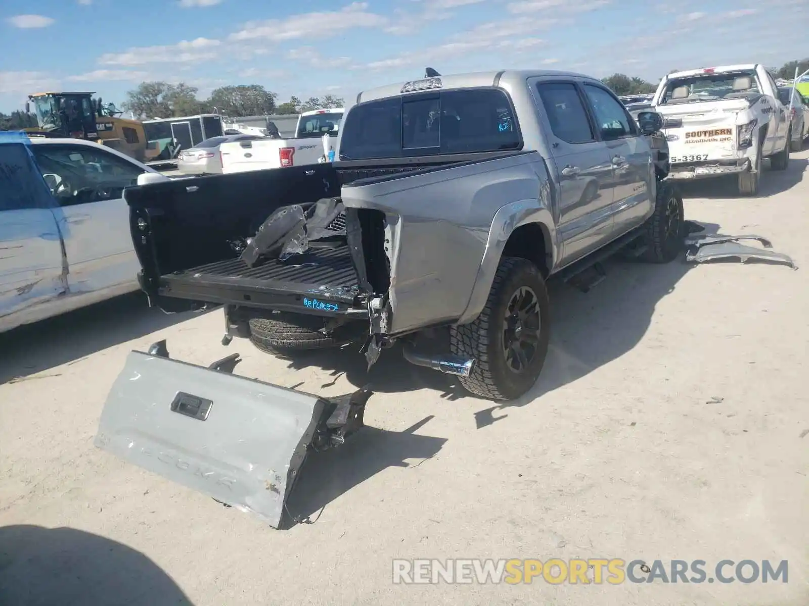 4 Photograph of a damaged car 3TMAZ5CN2KM100714 TOYOTA TACOMA 2019