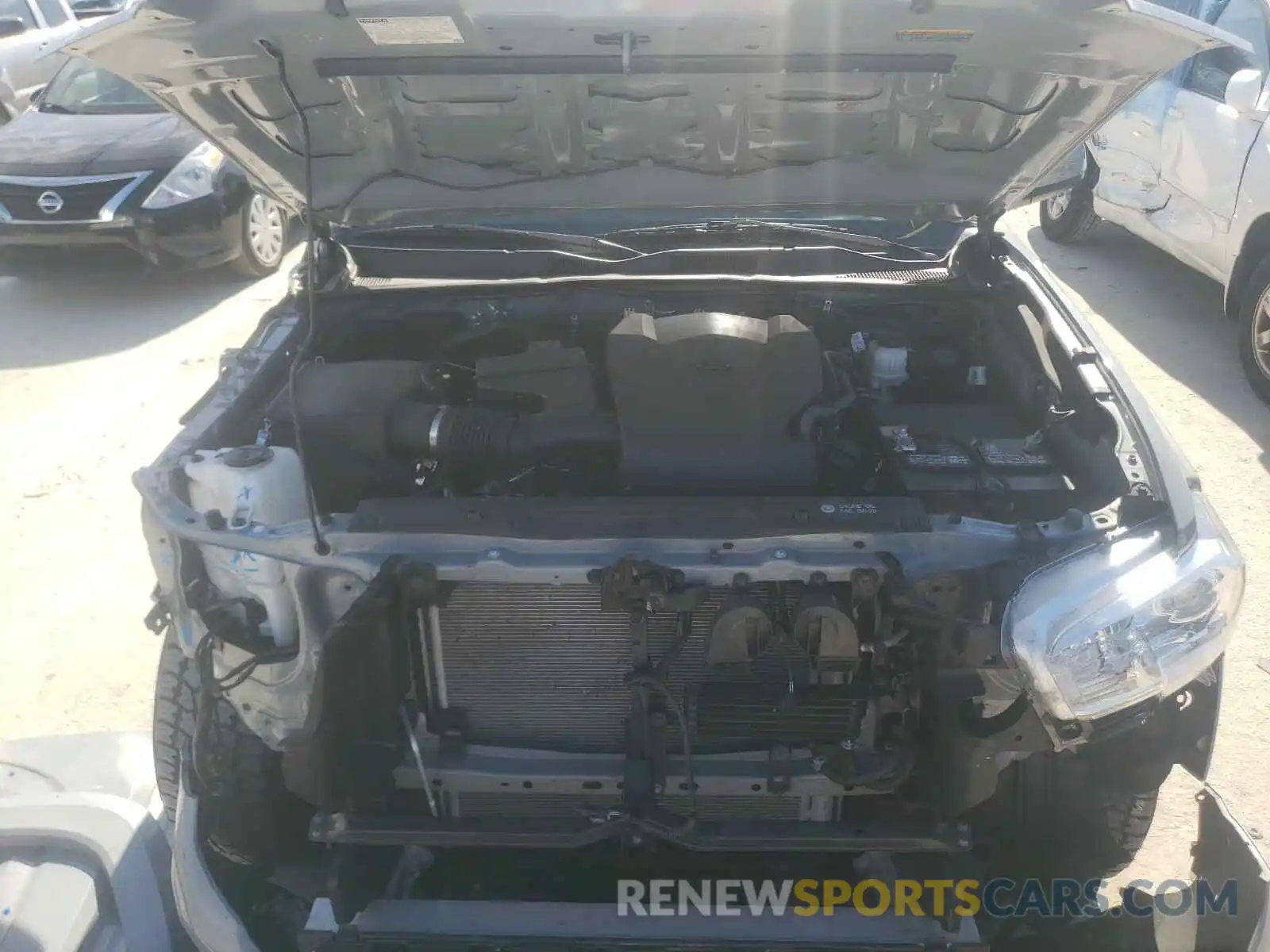 7 Photograph of a damaged car 3TMAZ5CN2KM100714 TOYOTA TACOMA 2019