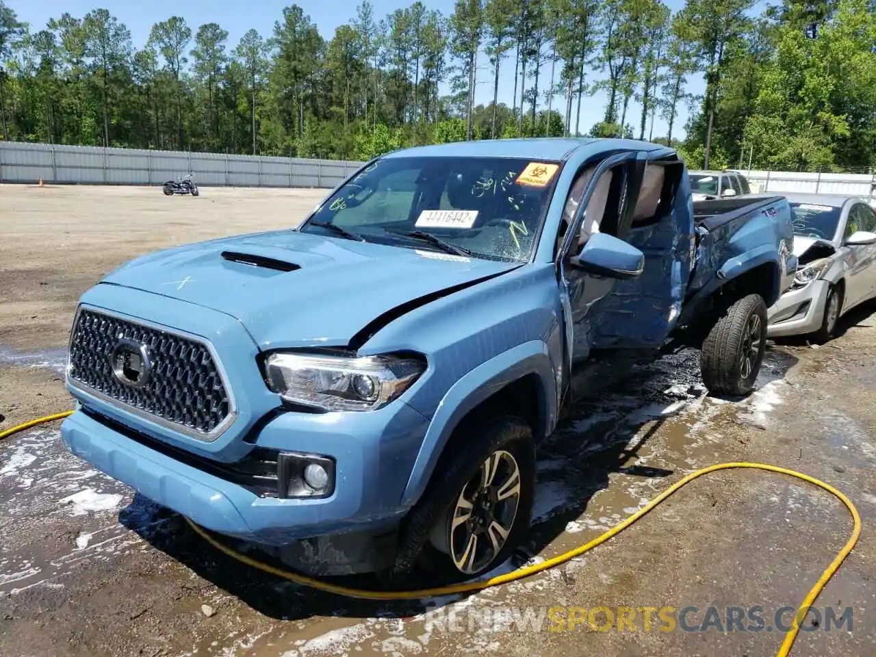 2 Photograph of a damaged car 3TMAZ5CN2KM101944 TOYOTA TACOMA 2019