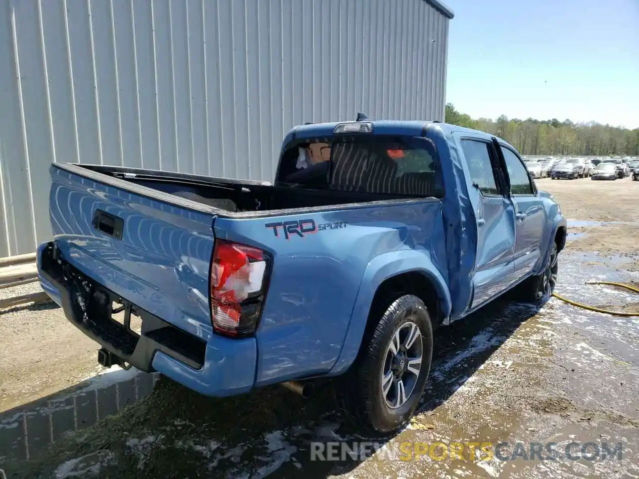 4 Photograph of a damaged car 3TMAZ5CN2KM101944 TOYOTA TACOMA 2019