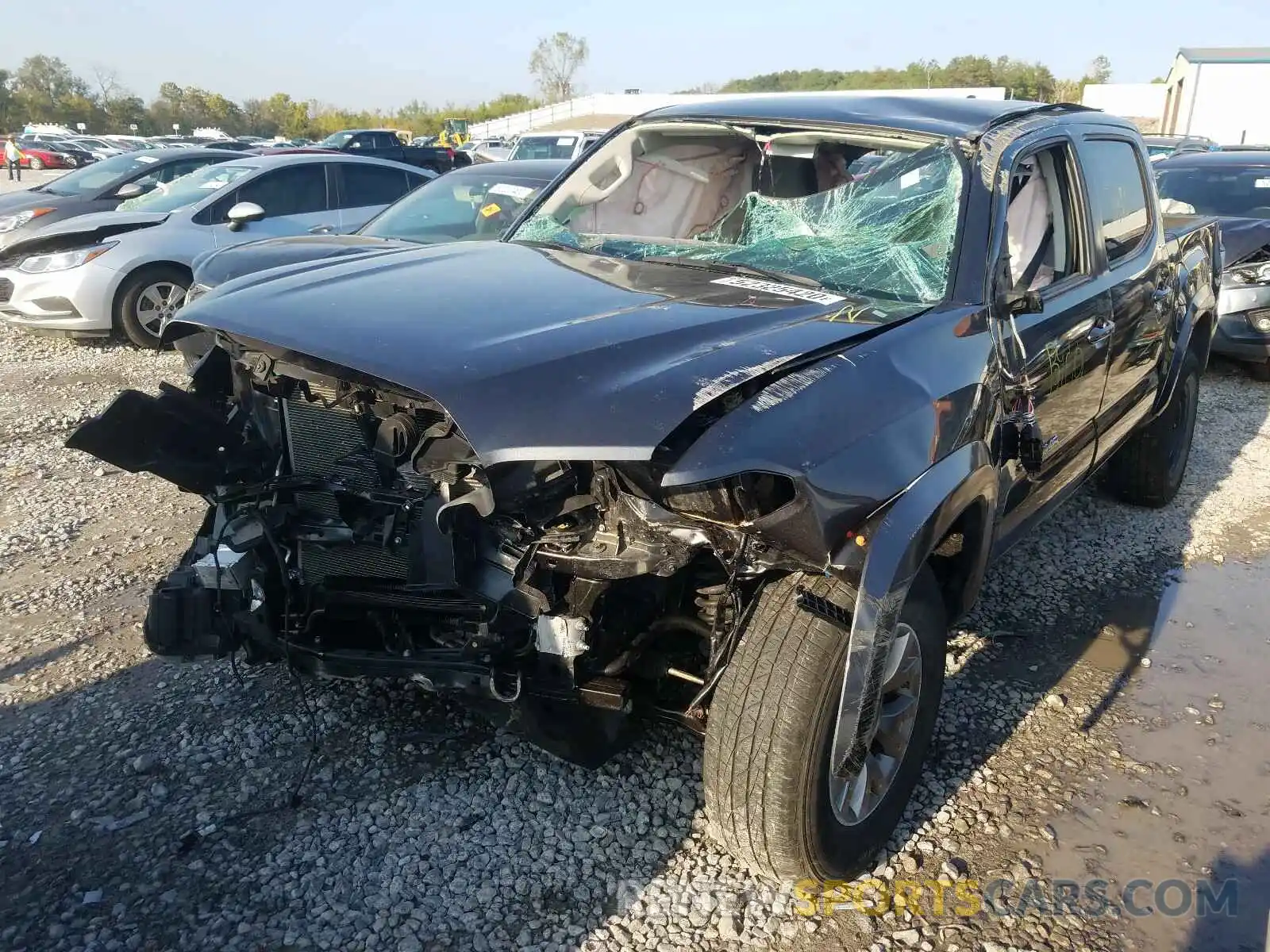 2 Photograph of a damaged car 3TMAZ5CN2KM103032 TOYOTA TACOMA 2019