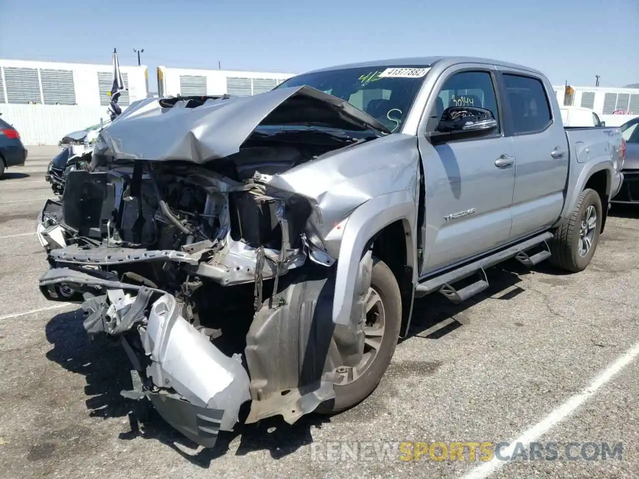 2 Photograph of a damaged car 3TMAZ5CN2KM107145 TOYOTA TACOMA 2019