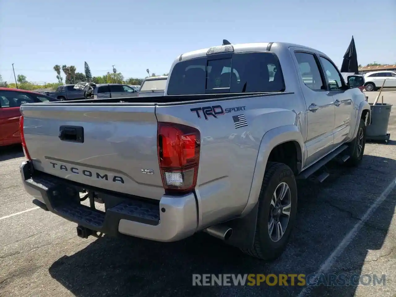 4 Photograph of a damaged car 3TMAZ5CN2KM107145 TOYOTA TACOMA 2019